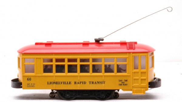 Lionel 60 Lionelville Rapid Transit Trolley LN: Lionel postwar 60 Lionelville Rapid Transit trolley with black lettering and two part bumpers. The bumpers have light surface rust, otherwise the trolley is C8.