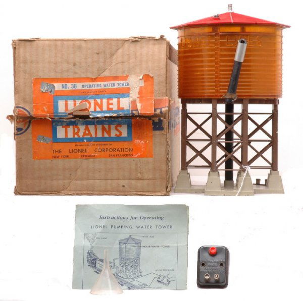 Lionel 38 Operating Water Tower Boxed: Lionel postwar 38 operating water tower, circa 1946 in OB with original cardboard inserts, instruction sheet, 96C controller and clear plastic tunnel. The tower is C6-7. The OB is sealed on one end an
