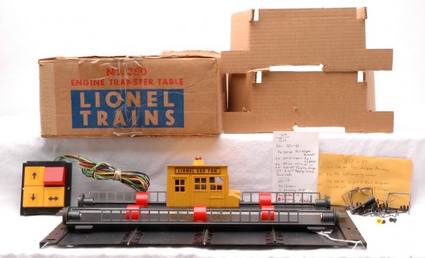 Lionel 350 Engine Transfer Table Boxed: Lionel postwar 350 engine transfer table with hardware and controller in OB with original cardboard inserts. The transfer table is C6-7. The OB is sealed on the bottom and has some tape.