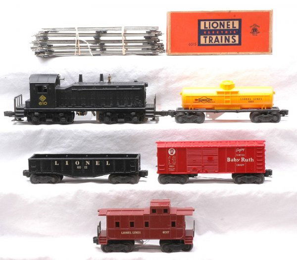 Lionel Freight Set 1001 610 6012 X6014 6015 6017: Lionel postwar freight set no. 1001, circa 1955 containing; 610 Erie NW2 switcher, 6012 gondola, X6014 red Baby Ruth boxcar, 6015 yellow Sunoco tank in OB, 6017 caboose, one straight section of track