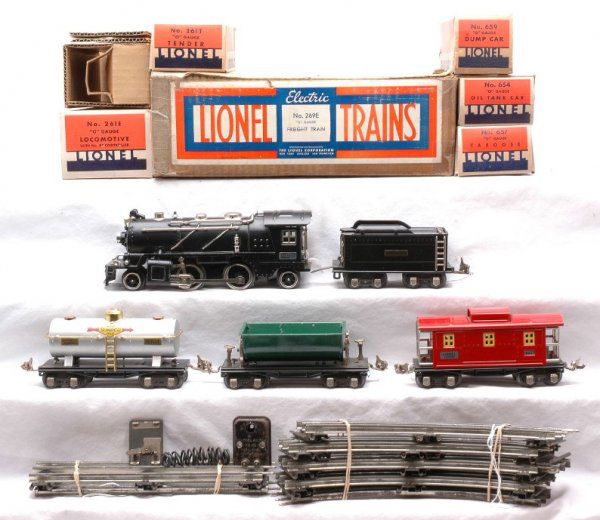 Lionel Freight Set 269E 261E 261T 654 659 657 OBs: Lionel prewar O gauge freight set no. 269E, circa 1935 in individual OBs and set box containing; 261E black 2-4-2 steam loco with nickel trim and original cardboard inserts, 261T tender, 654 silver Su