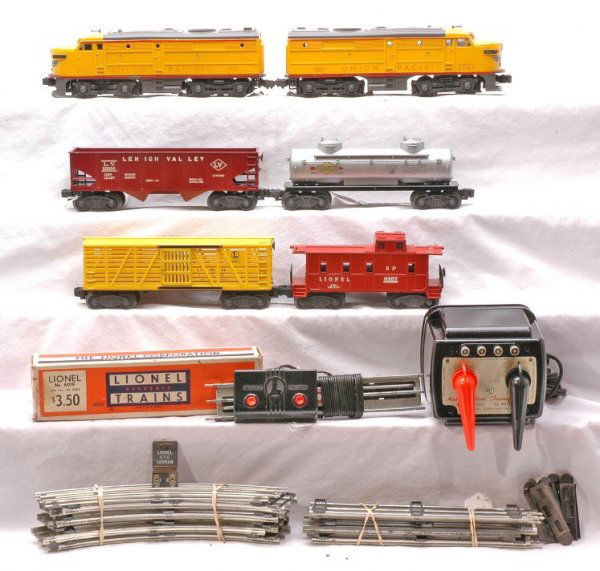 Lionel UP 1467W 2023 6456 6656 6465 6357 1033: Lionel postwar Union Pacific set no. 1467W, circa 1950 containing; 2023 AA Alco diesels, 6456 maroon hopper, 6656 stock car, 6465 Sunoco tank, 6357 SP caboose, 6019 remote control track set in OB, 103