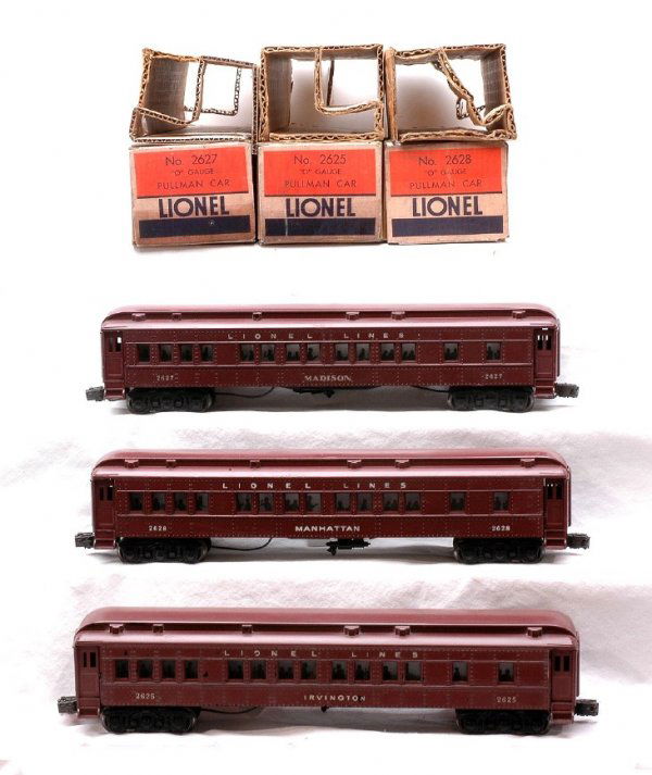Lionel Passenger Cars 2625 2627 2628 Boxed: Lionel postwar passenger cars; 2625 Irvington Pullman, 2627 Madison Pullman and 2628 Manhattan Pullman in worn OBs with tape repair and original inserts. All three cars have the silhouetted windows. T