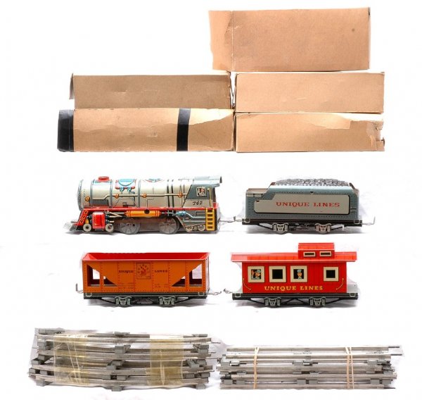 Unique Art Mfg. Co. Litho Freight Set Boxed: Unique Art Manufacturing Co. lithographed freight set in individual OBs containing; clockwork steam loco numbered 742, tender, hopper, caboose, eight curve sections of track and six straight sections 