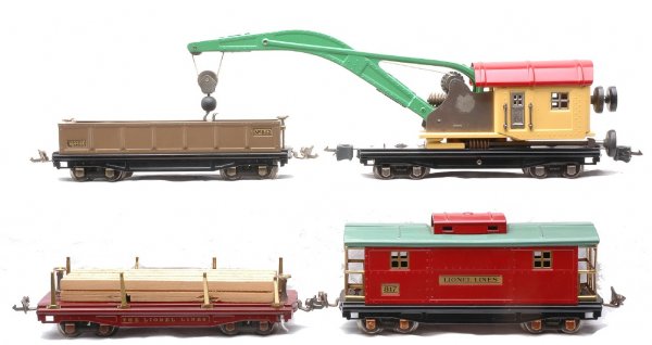 Lionel Restored Freight Cars 810 811 812 817: Lionel prewar O gauge freight cars; 810 derrick car with cream cab that has a vermillion roof, green boom and nickel journals, 811 maroon flatcar with wooden load, brass trim and copper journals, 812 
