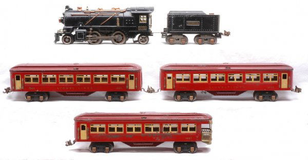 Lionel Red Set 5016E 262E 262T 1685 1685 1687: Lionel prewar O gauge red and maroon passenger set no. 5016E, circa 1934 containing; 262E black 2-4-2 steam loco with brass and trim, 262T tender with brass and copper trim, two 1685 Pullmans, 1687 ob