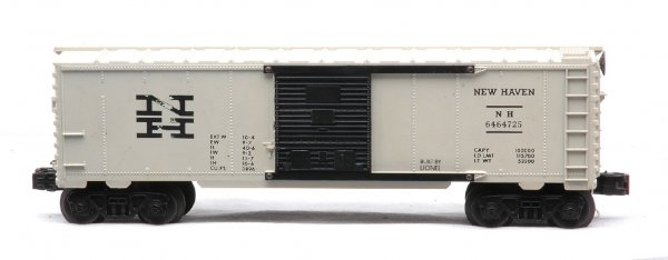Lionel 6464-725 NH Wh. Boxcar Chemically Altered: Lionel postwar 6464-725 white New Haven type IV boxcar with black doors. This car has been chemically altered and is one of the infamous fakes. The car is C6-7.