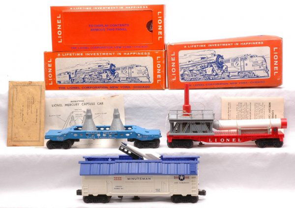 Lionel 3413 Mercury 3665 Missile OBs 6413 Car: Lionel postwar 3413 Mercury capsule launching car with instruction sheet in OB and a 6413 blue Mercury capsule carrying car with two capsules and 6413-10 packet containing two elastic clamps, wire bar