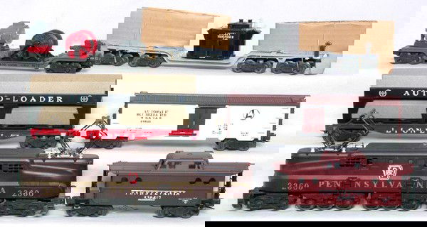 Unrun 2293W GG1 freight set in boxes: Lionel set 2293 GG1 freight set, this is another set that is not a put together set. Set includes 2360 single stripe GG1 that is test run, dark gray 3650 searchlight car, 6414 with auto sleeves, 6518
