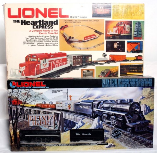Two nice Lionel freight sets in OB diesel & steam: Two nice boxed Lionel O gauge freight sets in original boxes with components, C8-9. 11783 Heavy Iron Rio Grande steam locomotive and tender with freight cars. 1764 Gulf, Mobile and Ohio The Heartland 
