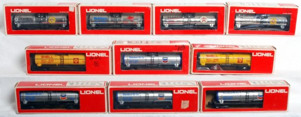 Ten Lionel O gauge tank cars in original boxes: Two Lionel O gauge 9152 Shell tanks, four 9153 Chevron tanks, two 9154 Borden Plated tank, 9156 Mobilgas Plated tank and 9147 Texaco tank. Cars look C7-9. Boxes show little to very light wear, price s