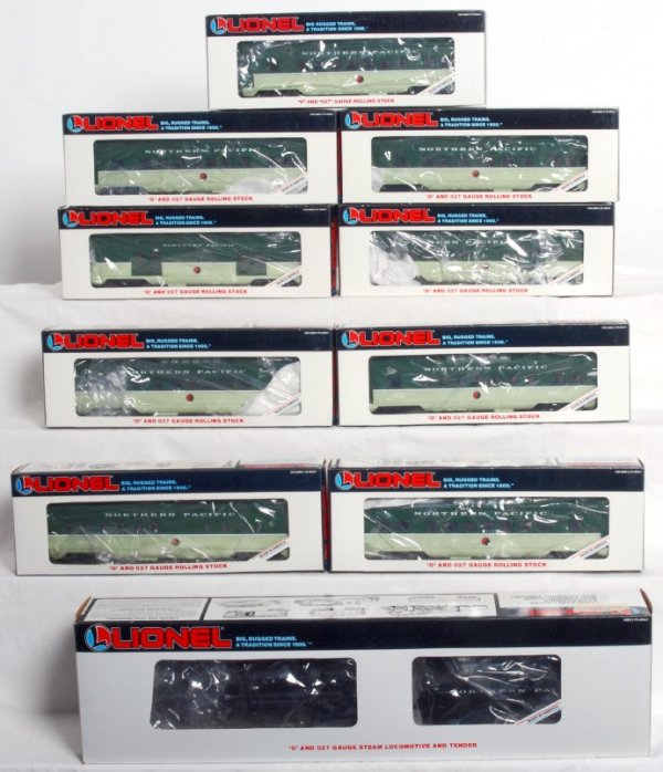 Lionel No. 18609 N.P. loco w/nine pass. in OB: Lionel O gauge No. 18609 Northern Pacific 2-6-4 steam locomotive and tender with nine matching passenger cars, C7-8 all in original boxes. Boxes show little wear. 16024 diner, 16034 baggage, 16035 com