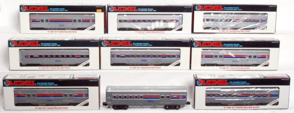 Nine Lionel O gauge Amtrak passenger cars in OB: Nine Lionel O gauge Amtrak passenger cars, eight in original boxes, C7-9. Three 16023 passengers, three 16033 baggage and two 16048 diners in original boxes. 16013 combo, no box. Boxes show little wea