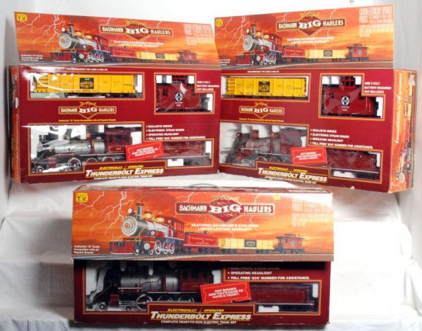 Three Bachmann No. 90011 S.F. Thunderbolt Express: Three Bachmann G scale No. 90011 Atchison, Topeka and Santa Fe Thunderbolt Express passenger train sets in original boxes, C7-8. Boxes show a little light wear.