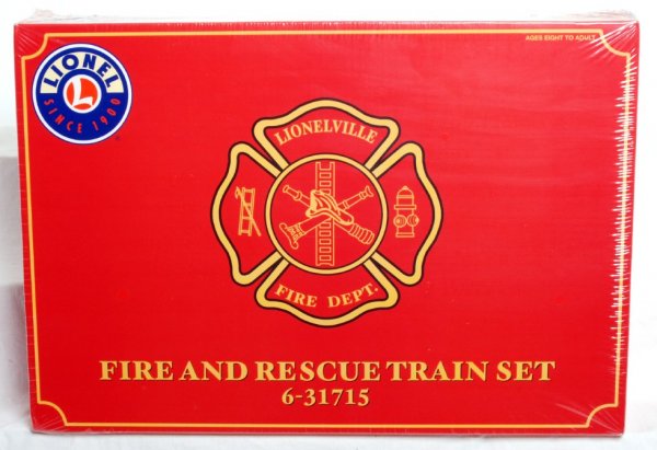 Lionel Fire Rescue Set: Lionel 31715 Fire Rescue train set. Set is in OB sealed in factory plastic. Set includes Hudson steam locomotive and tender, rescue car, tank car, flatcar with fire engine, fire car, and stretcher cab