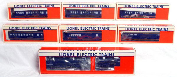 Lionel Wabash 4-6-2 and six passenger cars in OB: Lionel O gauge No. 8610 Wabash 4-6-2 steam locomotive and tender with six passenger cars in original boxes, nicer C8 area. Loco features operating smoke unit, electronic whistle and electronic Mighty