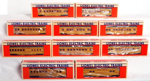 Ten Lionel O gauge Union Pacific passenger cars: Ten Lionel O gauge Union Pacific passenger cars in original boxes, C8-9. Boxes show no wear to very light wear. 16068 Romeo baggage, 16069 New Haven combo car, two 16070 Plainfield Pullman coaches, 16