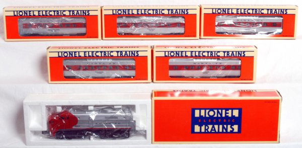 Lionel No. 18919 S.F. Alco with five pass. cars: Lionel O gauge No. 18919 Santa Fe non-powered dummy Alco A unit with operating horn, four 16056 vista dome cars and 16060 observation. Trains look C9 area. Boxes show little wear, loco box has a torn