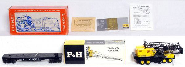 Mint Lionel 6828 Harnischfeger crane car, OB: Lionel postwar O gauge 6828 Harnischfeger crane car, great lettering, unrun flat. Crane is light yellow version, mint. Includes factory sealed 6828-141 packet, inst. sheet and P&H booklet. -100 OB C9-