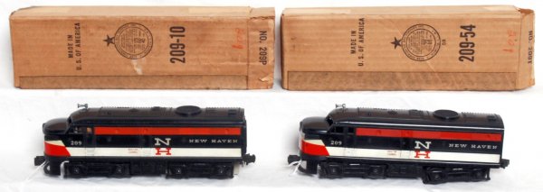 Lionel postwar 209 New Haven Alco AA units: Lionel postwar O gauge 209 New Haven Alco AA units, good pilots, C7. 209T OB C7-8. 209P OB has a hole in one corner.