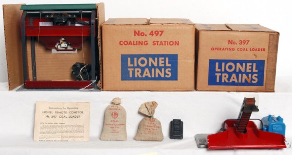 Lionel postwar No. 397 and No. 497 in OB: Lionel postwar No. 397 operating coal loader and No. 497 coaling station in original boxes. 397 has a thin swipe of layout paint along the edge of one short side. Accessories should clean C7 or may be