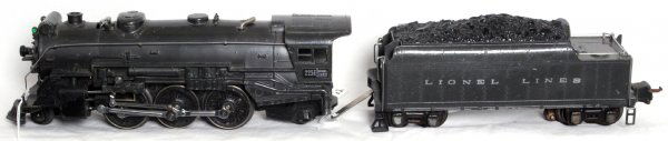 Lionel No. 225E steam locomotive rare gray 2235W: Lionel No. 225E steam locomotive and rare die cast gun metal gray 2235W tender, loco is missing a marker jewel, tender has a broken rear pickup shoe mounting plate. Trains look nice clean and shiny C6