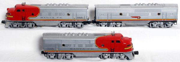 Lionel 2343 Santa Fe F3 ABA units: Lionel postwar O gauge 2343 Santa Fe F3 ABA, nice graphics and decals. Great looking original set. AA are C7+, B is C7. A couple of portholes lenses are not original and one is missing.