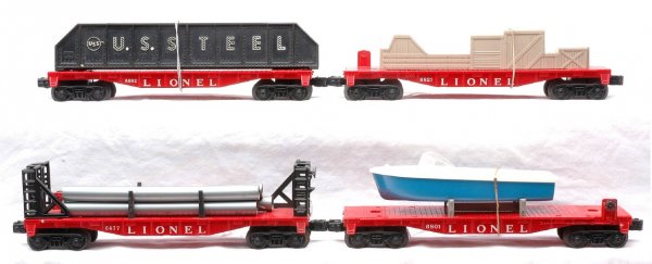Lionel 6477 Bulkhead 6801 6802 6821 Flatcars: Lionel postwar freight cars; 6477 Bulkhead car with pipes, 6801 flatcar with boat that has a blue hull and white deck, 6802 flatcar with two U.S. Steel girders and 6821 flatcar with crates. The 6801 h