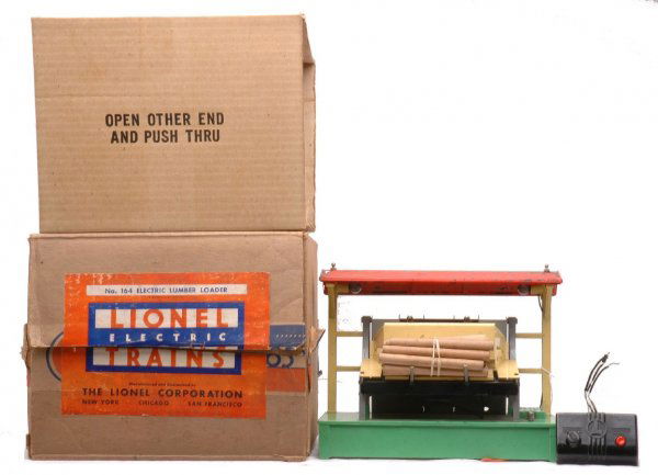 Lionel Prewar 164 Electric Lumber Loader Boxed: Lionel prewar O gauge 164 electric lumber loader with original cardboard insert, 97C controller and wooden logs in OB. This is the 1942 version with a gray mechanism. The roof is orange and the paint