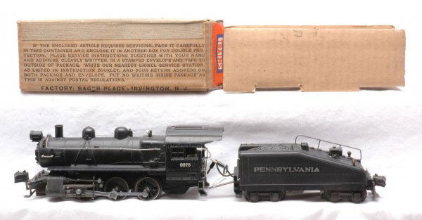 Lionel 228 Switcher 2227B Pennsy Tender OB: Lionel prewar O gauge 228 semi scale 0-6-0 switcher with a 2227B Pennsylvania slope back tender with original cardboard insert in OB. The pin is missing from the coupler on the tender. The loco and te