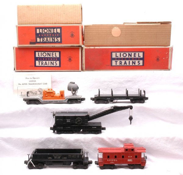 Lionel Freights 2460 3461 6520 OBs 3469 6257: Lionel postwar freight cars including; 2460 black Bucyrus Erie crane with original cardboard insert, 3461 operating log car with original cardboard insert, 6520 searchlight car with an orange generato
