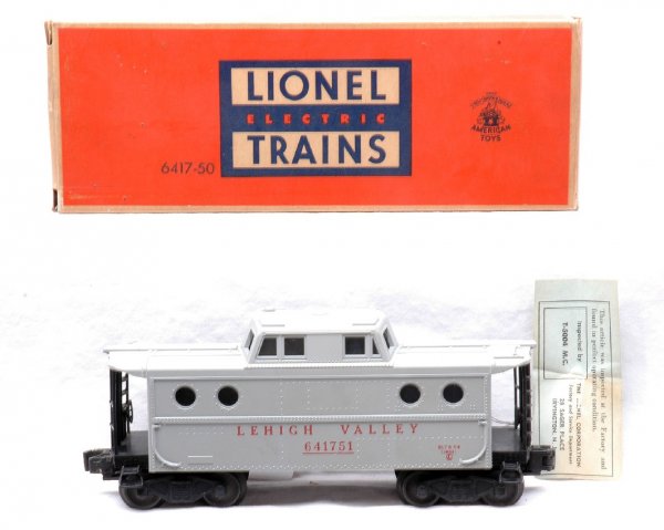 Lionel 6417-50 Gray Lehigh Valley Caboose LN OB: Lionel postwar 6417-50 gray Lehigh Valley caboose with inspection tag in OB, C8. The OB has tape repair on one end and is missing the tuck flap and one interior flap and the other side has all flaps a