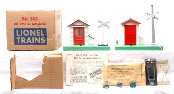 Lionel Postwar 145 w/OB 45N Automatic Gateman LN: Lionel postwar 145 automatic gateman with original cardboard insert, inspection tag, envelope complete with 145C contactor, four connecting wires and instruction sheet. Also included is a 45N automati