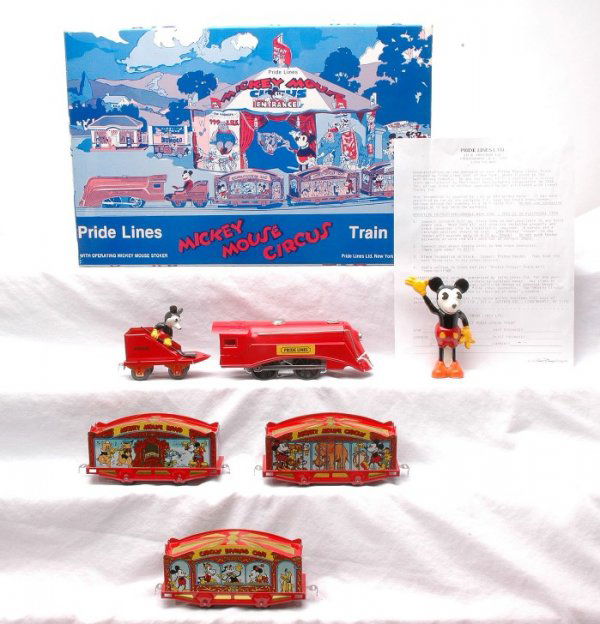 Pride Lines 1536 Mickey Mouse Circus Train MINT: Pride Lines no. 1536 Mickey Mouse circus train in set box. Also included is a Mickey Mouse barker. Both items are C9.