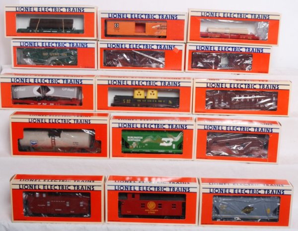 Lot of 15 Lionel rolling stock: Lot of 15 cars. Includes 9283 Northern Pacific log car in incorrect box, 9130 ATSF log car in incorrect box. 6104 Southern Hopper, 17110 Union Pacific hopper, 5715 Santa Fe reefer, two 19519 Frisco st