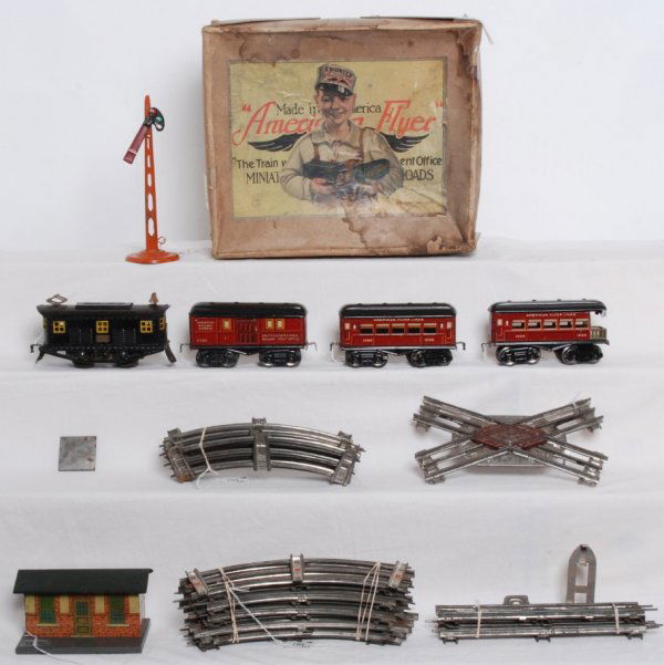 American Flyer boxed No. 1221 narrow gauge set: Prewar American Flyer narrow gauge passenger set consisting of: 3011 electric locomotive, 1205 U.S. Mail RPO car, 1206 coach and 1206 observation car. Trains look very nice C6+. No. 90 station and a s