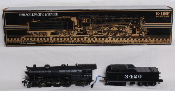 K Line ATSF 4-6-2 Pacific: K Line 4-6-2 ATSF Pacific 3330-3420. Body is diecast. Features smoke and sound. Loco run lightly. Has OB and paperwork. C8