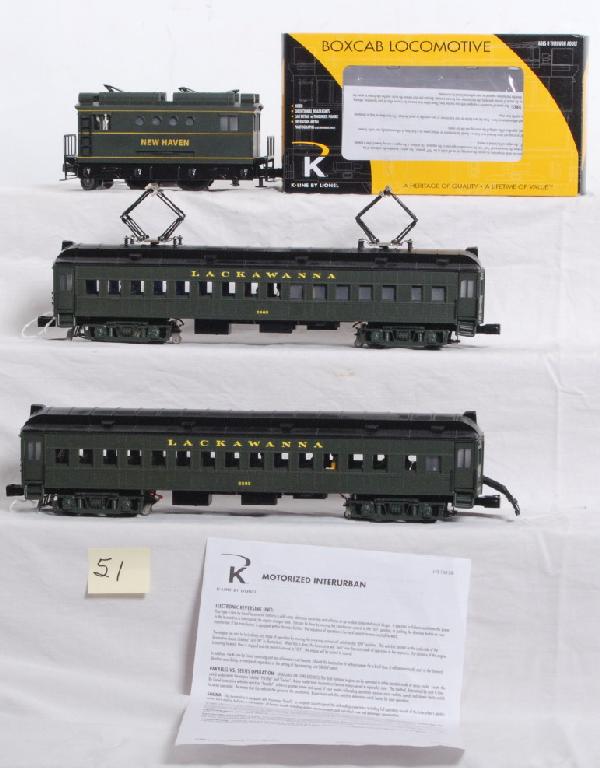 K Line by Lionel interurbans and NH box cab: K line by Lionel 6-22141 Lackawanna interurban set. Locos feature Train FX and operating headlights. Dummy car has box rubs on both headlights. Otherwise looks C8-9. 21268 New Haven box cab is in OB a