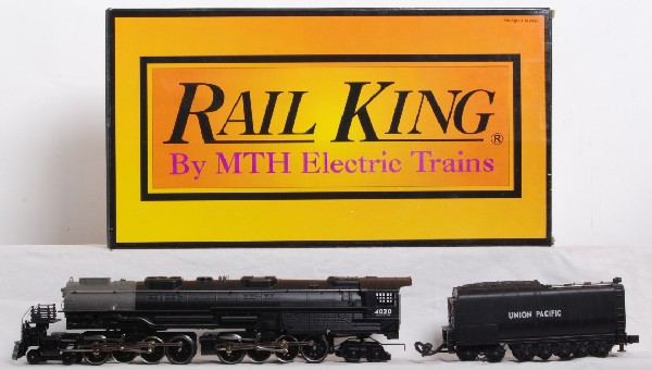 Railking Union Pacific big boy: Railking 30-1129-1 Union Pacific big boy in OB with instructions. Loco features Protosound, Smoke, Electrocoupler and more. OB has some corner wear on the ends. Loco has been run and is C8 condition.