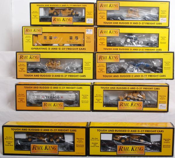 10 Railking Construction, Snow plow, tank cars: Ten Railking cars. Includes 30-7614 flat with dump truck, 30-7616 flat with earth mover, two 30-7618 depressed flat with dozer, 30-7619 flat with front end loader, 30-7620 flat with grader, 30-7611 fl