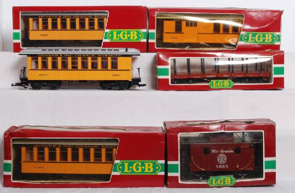 6 LGB Rio Grande passenger, freight cars: 6 LGB Rio Grande cars 5 of 6 in OBs. Includes three 3080 Passenger coaches. One has no OB. 3081 Combo passenger car, 4060 flatcar, and 4065 caboose. Some OBs have minor water damage. General condition
