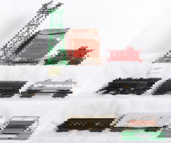 Postwar Lionel 1654, 1654W, 2465, 2452, more: Postwar Lionel O gauge 1654 loco, 1654W tender w/whistle, 2465 Sunoco tank, 2452 Pennsylvania gondola, 3472 milk car, 2257 caboose, 3462P milk platform and 395 floodlight tower in worn OB. Please view