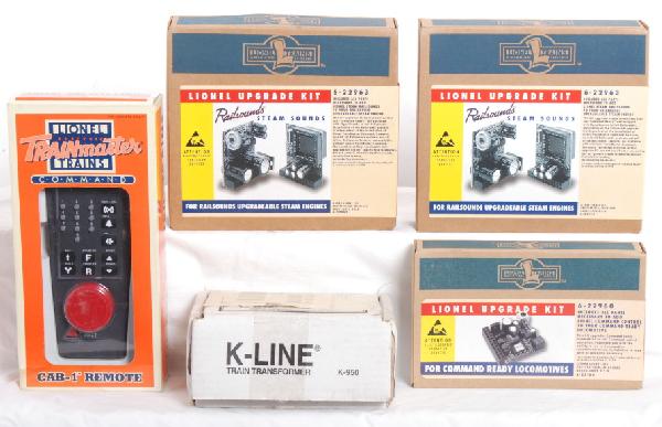 Lionel TMCC kits, Cab-1 and K Line horn boards: Lionel TMCC and Railsounds upgrade kits. Includes two 22963 Railsounds steam upgrade kits, 22960 TMCC upgrade kit. Upgrade kits are sealed C10. 12868 Cab1 remote in OB. C8-9. Also included are four K