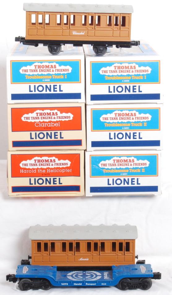 9 Lionel Thomas & Friends cars: Lionel Thomas & Friends cars. Includes two 15118 Clarabels one no box and C7-8 one has OB and C8-9, 15117 Annie no OB C7-8. two 16173 Harold the Helicopter cars. One has OB C8-9, one is flat only . C8