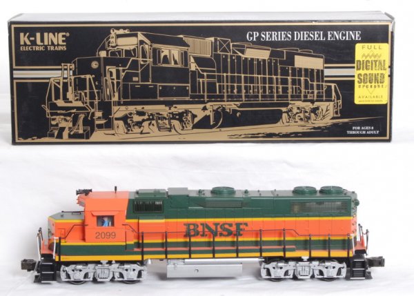 K Line BNSF GP38-2 with horn: K Line BNSF K2411-2099 GP38-2 in OB. Loco Features a horn, directional lighting, spinning roof fans, ditch lights and more. Loco comes with all paperwork and is C8-9 condition. OB has some minor corne