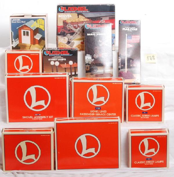 Lionel building kits, lights, signals, etc.: Lionel three sets of 12874 street lamps in OB C8-9, 12708 street lamps C8-9, 12709 banjo signal 12709 Banjo signal C8-9. 12898 flag pole, 2127 diesel horn shed C8, 12962 118 passenger service station 