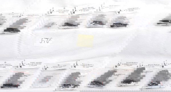 10 Z Stuff DZ1000 Switch Machines: 10 Z stuff DZ1000 switch machines with 1002 remotes included. All machines are sealed in OBs except for one. These machines will work with Gargraves, Ross, Curtis and Atlas. Also includes two extra DZ