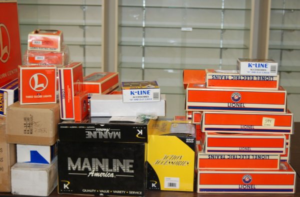 Large lot of Lionel, MTH, Railking boxes #1: Large lot of Lionel, MTH, Railking boxes. Railking boxes include 30-2805-1 Southern Trainmaster, 30-1056 Hi Tension towers, 30-2222-1 Long Island SW8, 30-1184-1 Boston and Maine 0-8-0, 30-1223-1 Bosto