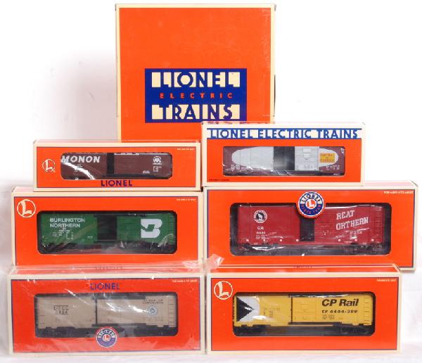 6 Lionel 6464 PS-1 boxcars, Lilly Tulip, Etc: Lionel modern 6464 and PS-1 boxcars in OBs. 6464 cars include 19279 Central of Georgia in 19276 set box, 29251 Burlington Northern, 39276 Lilly-Tulip Archive, 19289 Monon, 29252 Canadian Pacific, and 