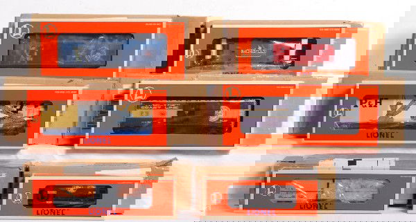 12 Lionel Monopoly, TTOS, LRRC cars: Lionel modern cars in OB. Lionel Monopoly series cars include 52158 Mint car, 52160 tank car, 52159 transformer car, and 52161 caboose. Other cars include 39201 Hudson and 29248 NYC F3 Century Club bo